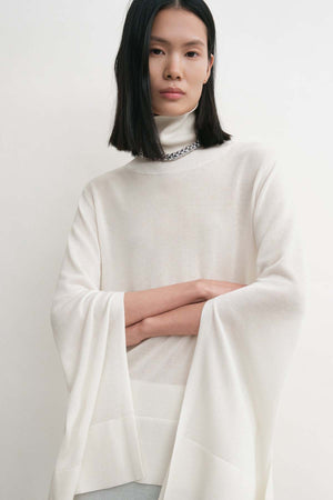 Slit Sleeve Turtleneck