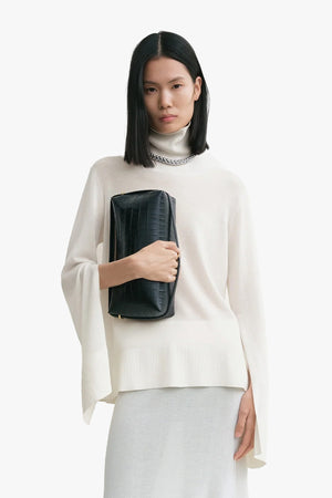 Slit Sleeve Turtleneck