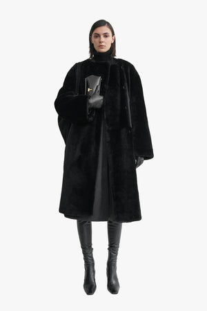 Collarless Shearling Coat